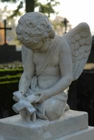 statue of a boy angel